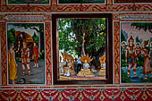 Vientiane, Laos - Pha That Luang, among the Other structures on the ground there is an open sala decorated with brightly colored paintings.  